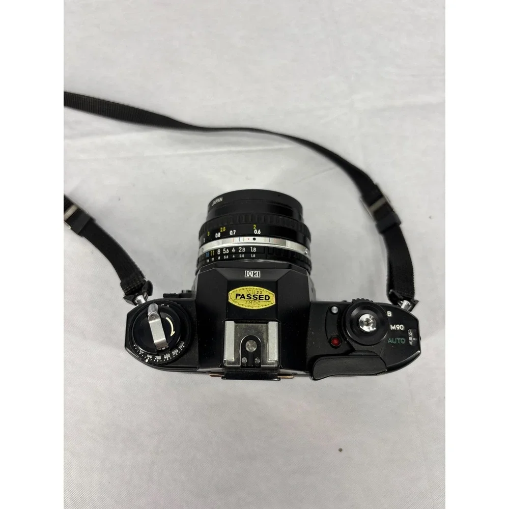 Nikon EM 35mm Film SLR Camera 50mm f/1.8 Lens Black Compact Vintage Japan